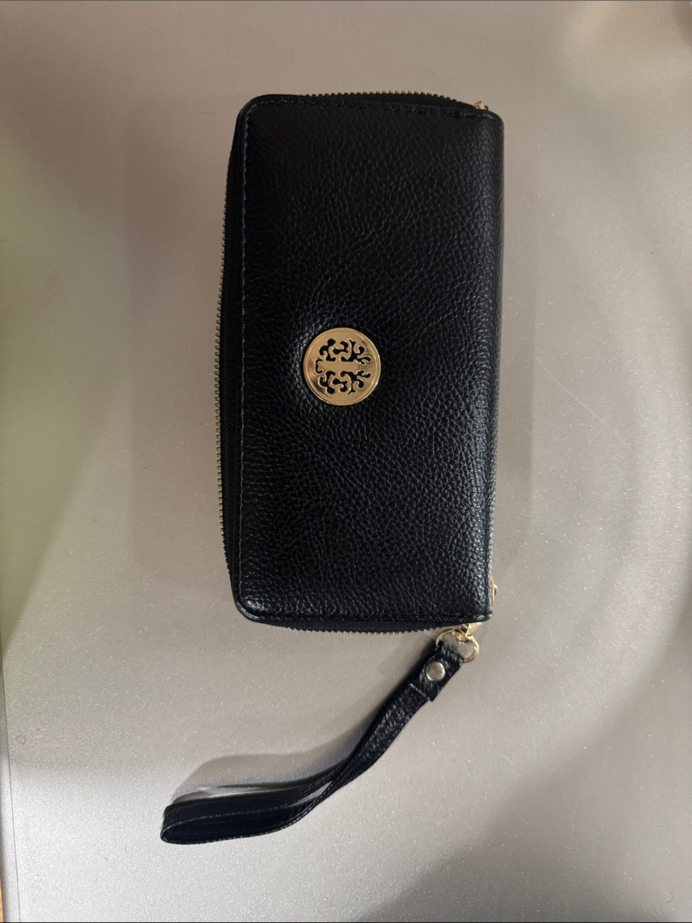 Black Zip-Around Wristlet Wallet with Gold Logo